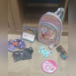 8: jojo- backpack,2 bows,mini,eyelashes,sunnies,stickers,face mask